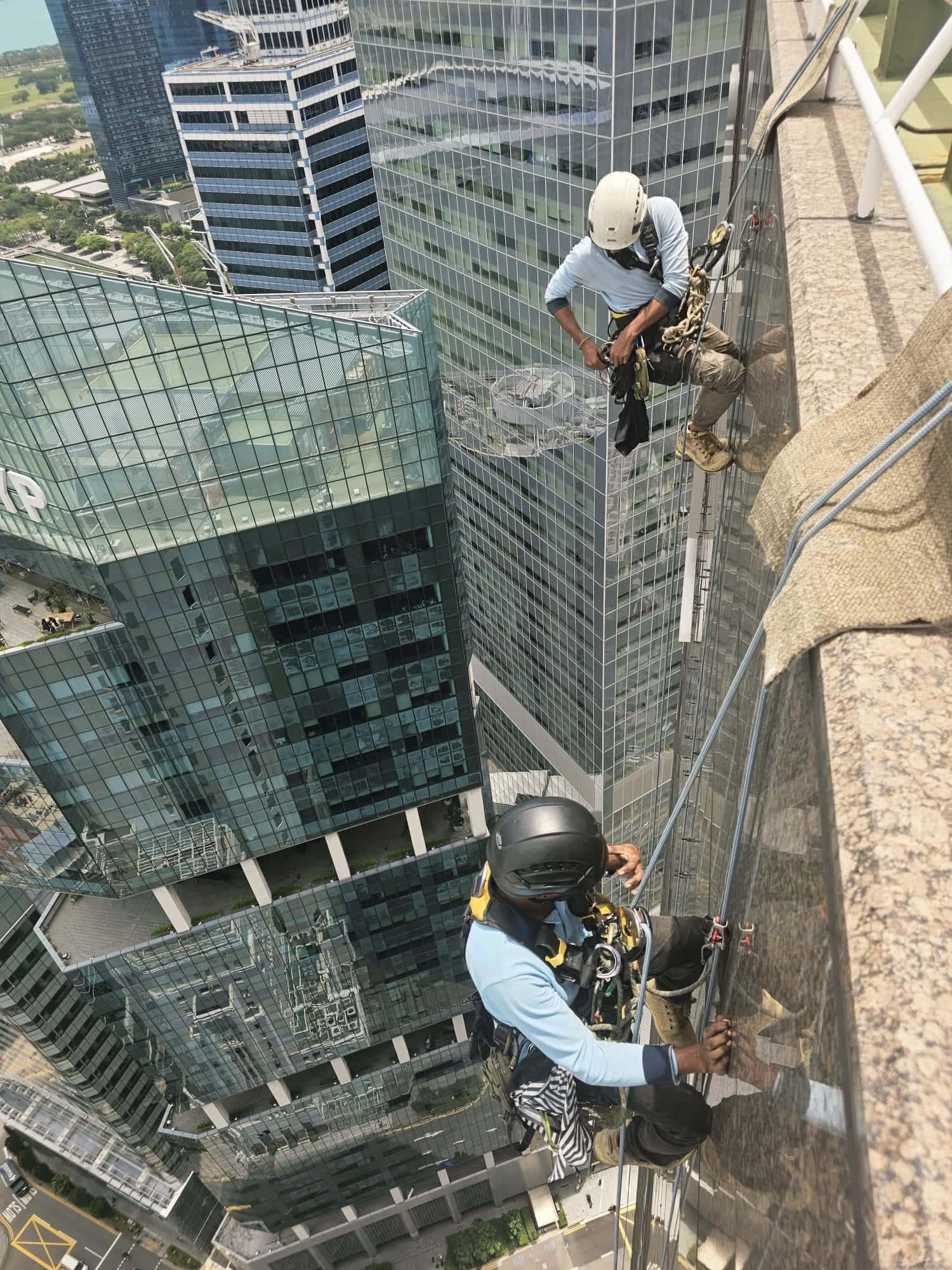 Hydroseal rope-access team on a high-rise commercial building in Singapore